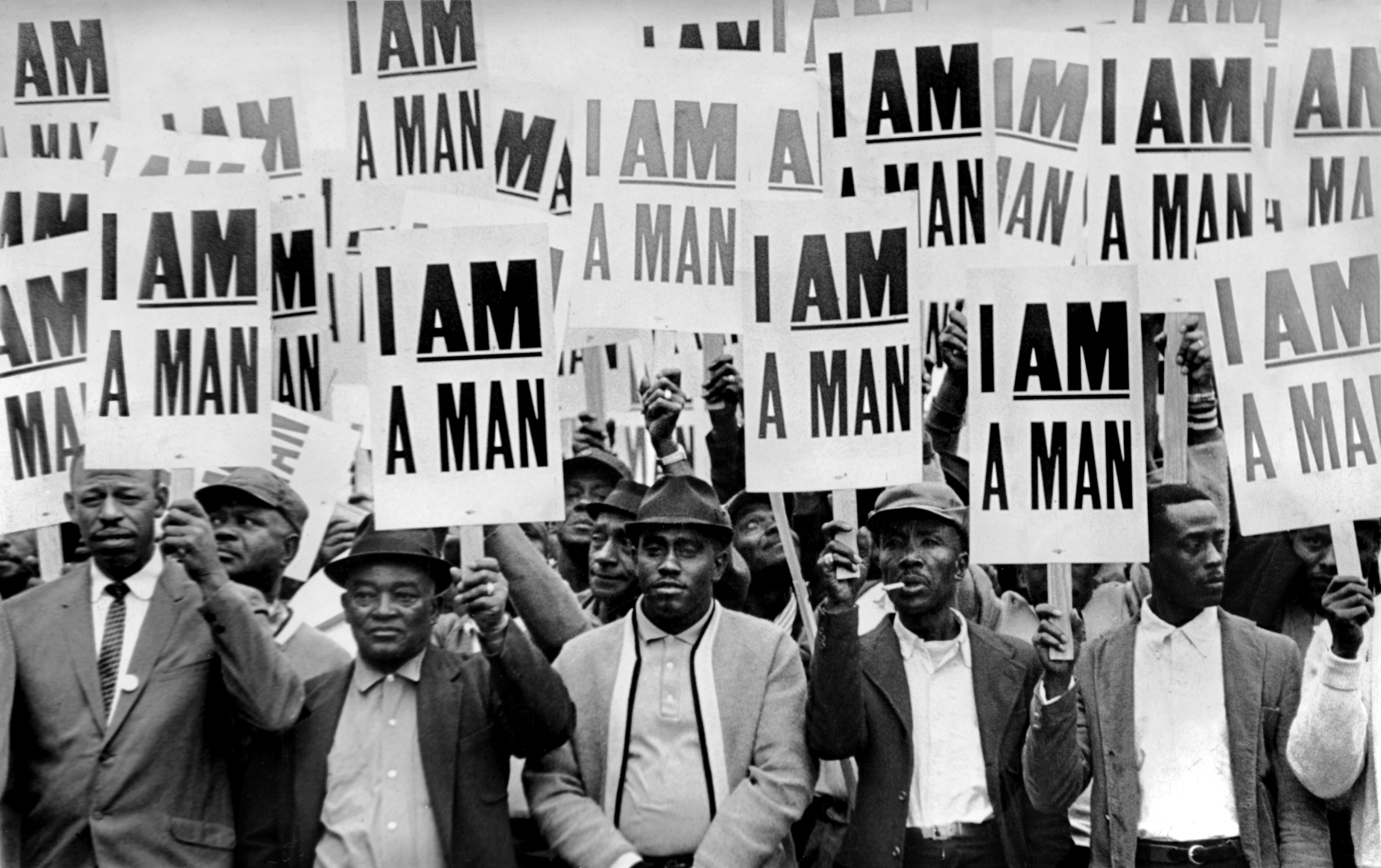 photo of William Lucy at a march where people held up "I am a man" signs