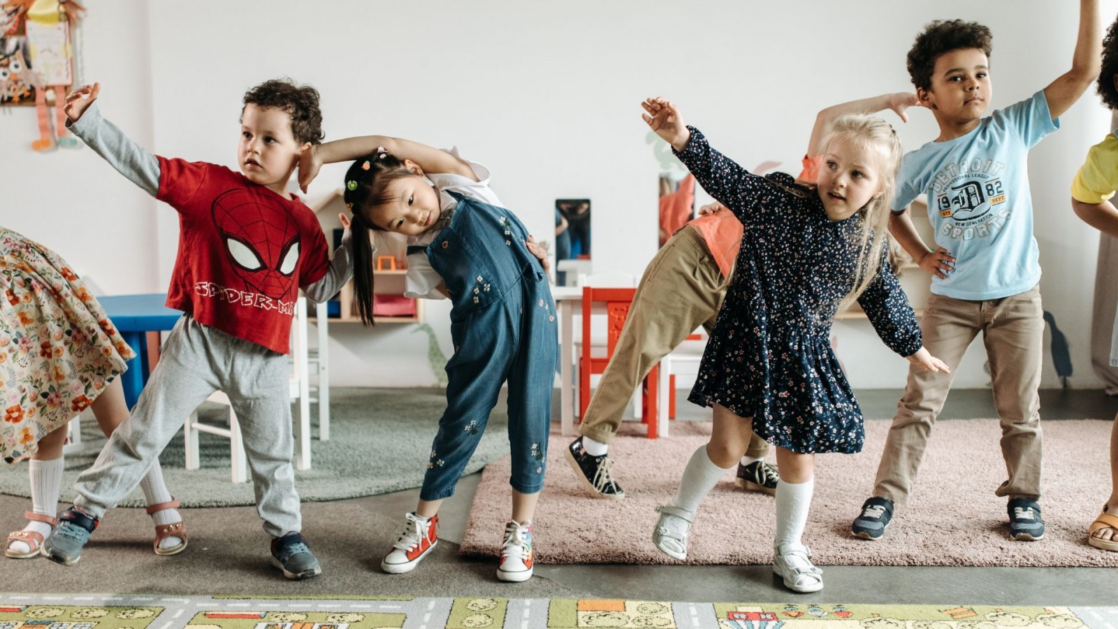 Image of four kids dancing