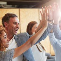 Image of group giving a high five