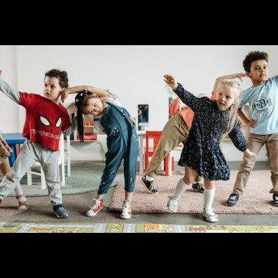 Image of four kids dancing